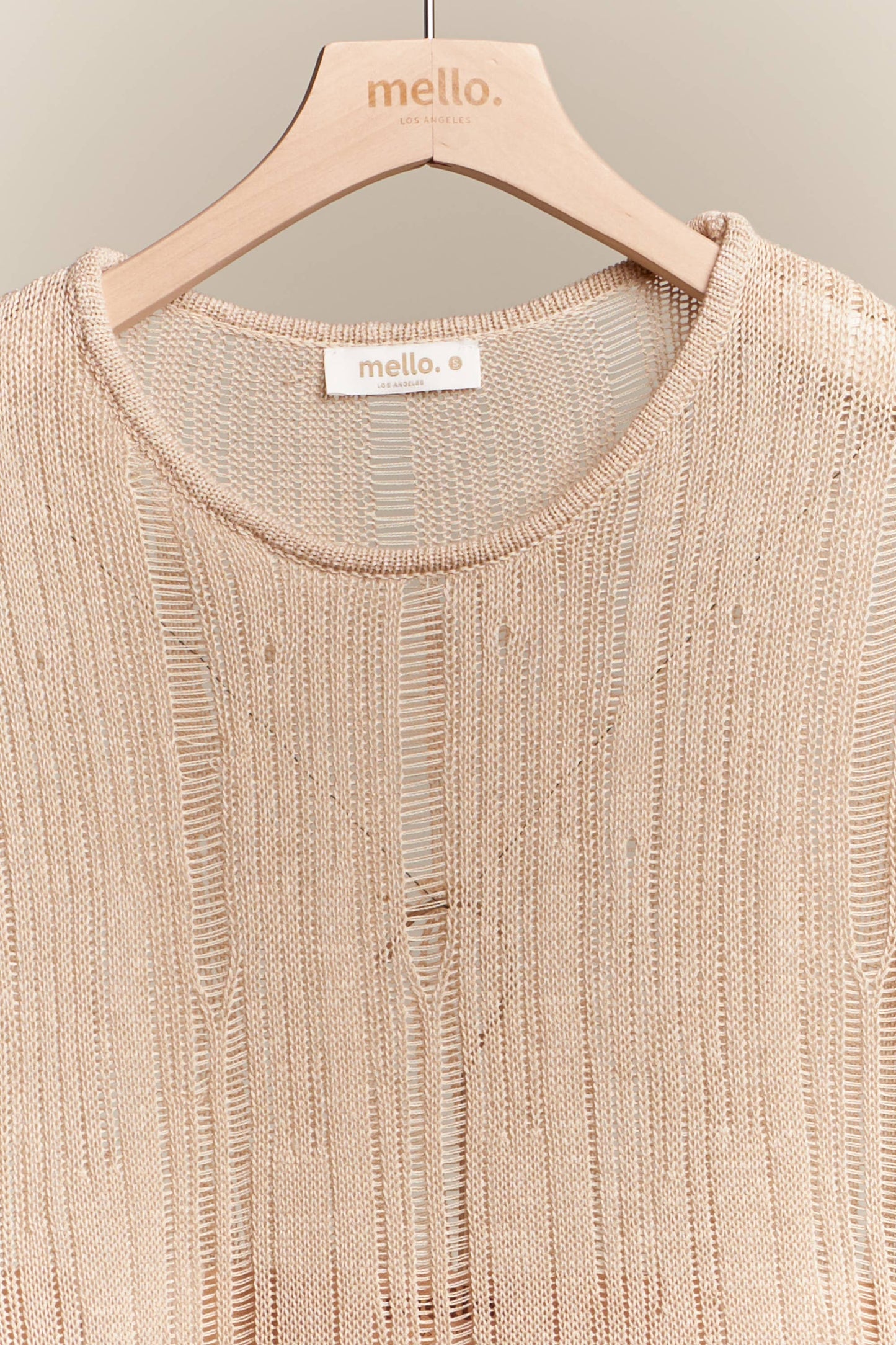 Boat Neck Sleeveless Top with Lace Hem Mello.