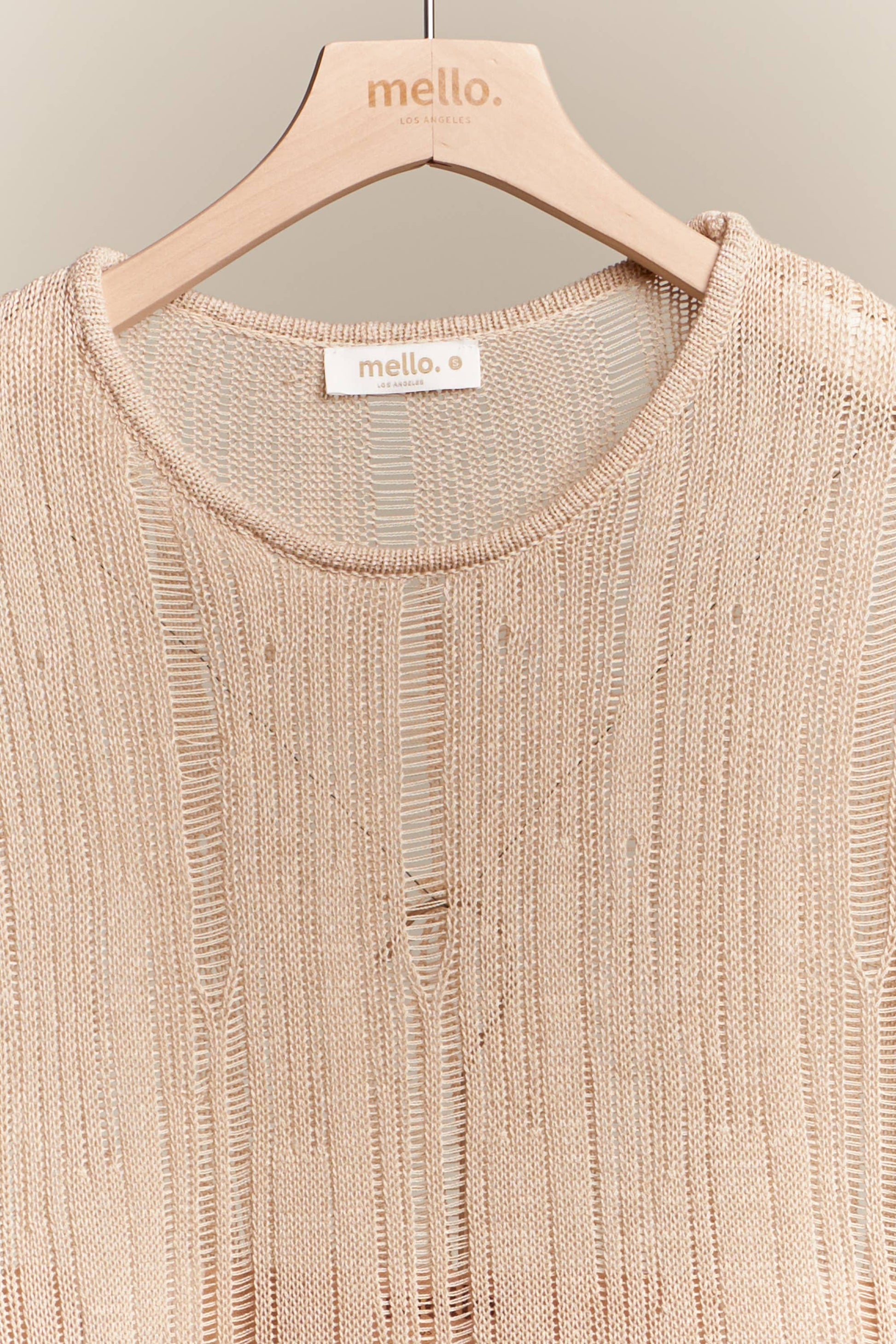 Boat Neck Sleeveless Top with Lace Hem Mello.