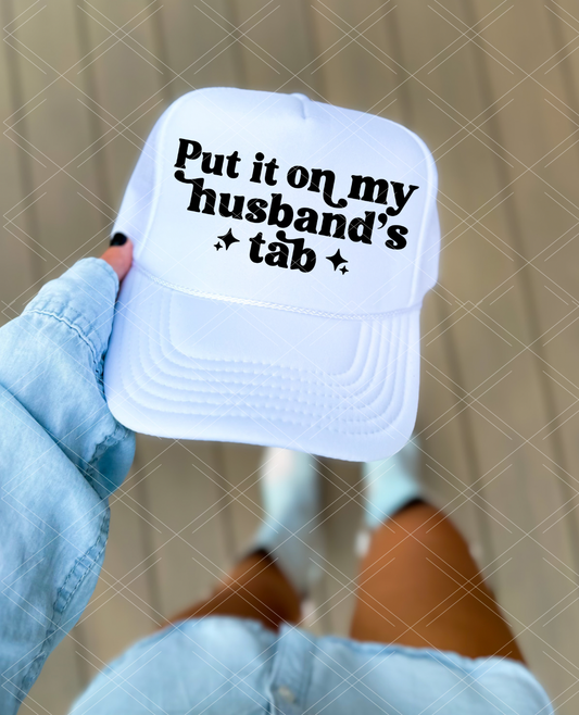 Put it on My Husband's Tab Trucker Hat 926 WEST