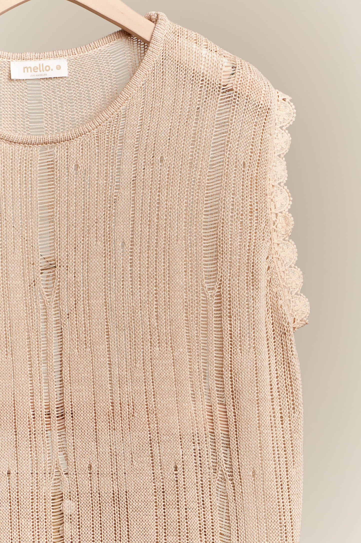 Boat Neck Sleeveless Top with Lace Hem Mello.