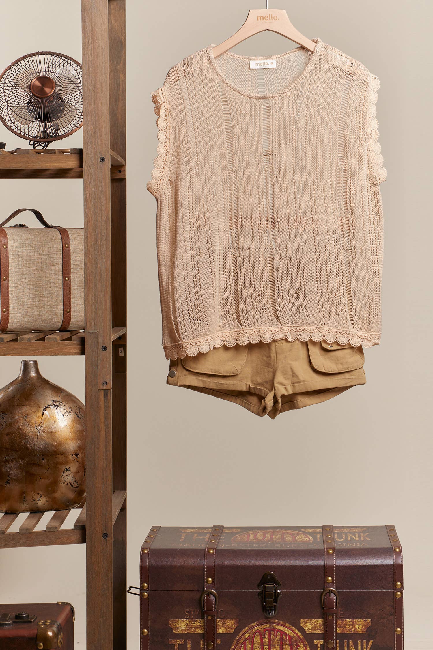 Boat Neck Sleeveless Top with Lace Hem Mello.
